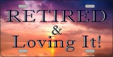 Retired and Loving it Novelty Metal License Plate / Sign / Plaque