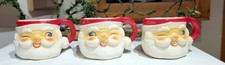 Three Vintage 1960s larger Holt Howard Winking Santa Claus Mugs. Made in Japan.