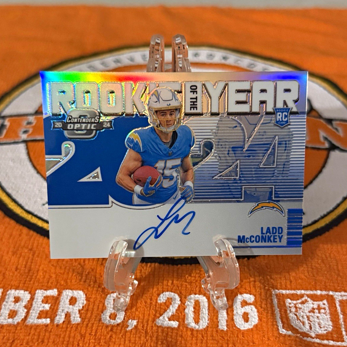 2024 Contenders Optic Ladd McConkey Rookie of the Year Auto /99 #11 Chargers RC