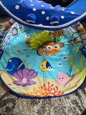 baby swing and bouncer and play mat and tub and sit me up chair