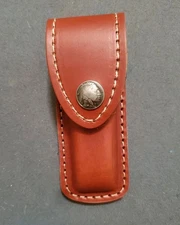 Custom sheath Fits Buck 110 . Heavy Leather, lined inside no metal contact.