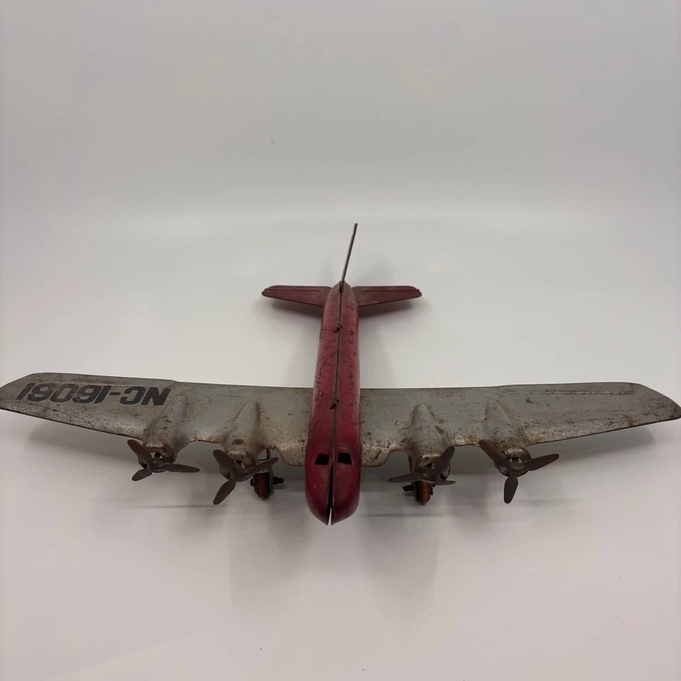 Vintage Wyandotte Pressed Steel Airplane Toy 4-Engine Airliner Red & Silver NC-1 - Image 3 of 4