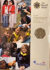 ROYAL MINT 2010 50p GIRLGUIDING IN CARD