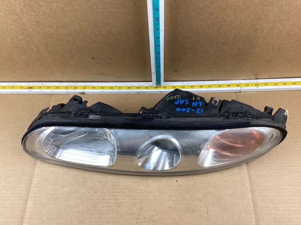 Левая передняя фара в сборе со стороны водителя для Oldsmobile Aurora 2001-2003 годов выпуска от оригинального производителя - Изображение 2 из 4