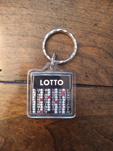 Portachiavi LOTTO retrò da collezione vinci con lotto scegli 49 gioco - Foto 1 di 4