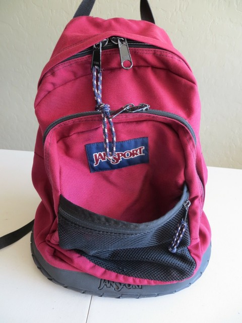 red bottom bookbag