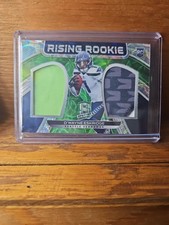 2021 Spectra Dwayne Eskridge Rising Rookie Patch 12/35 #RRM-DE