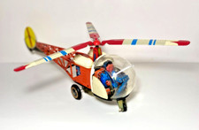 VINTAGE FRICTION HELICOPTER W/ ACTIVE PILOT MADE IN CHINA