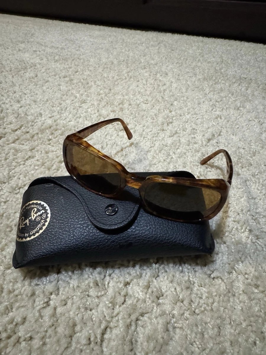 Preços baixos em Óculos de Sol Ray-Ban Oval para mulheres com