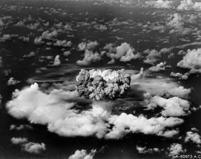 Aerial view of a mushroom cloud rising from underwater atom bomb te- Old Photo