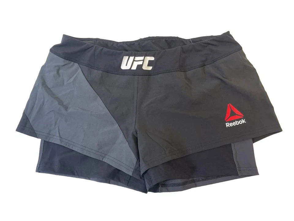 Pantalón corto Reebok UFC para mujer octágono en blanco negro/grava - 32" Foto 2 de 4
