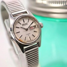 Montre SEIKO pour femme automatique date ronde argentée d'occasion