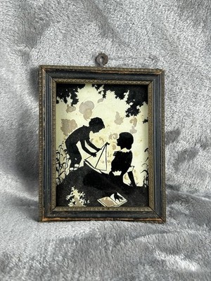 Antique Victorian Silhouette Scene Boy With Toy Sailboat & Woman With Book