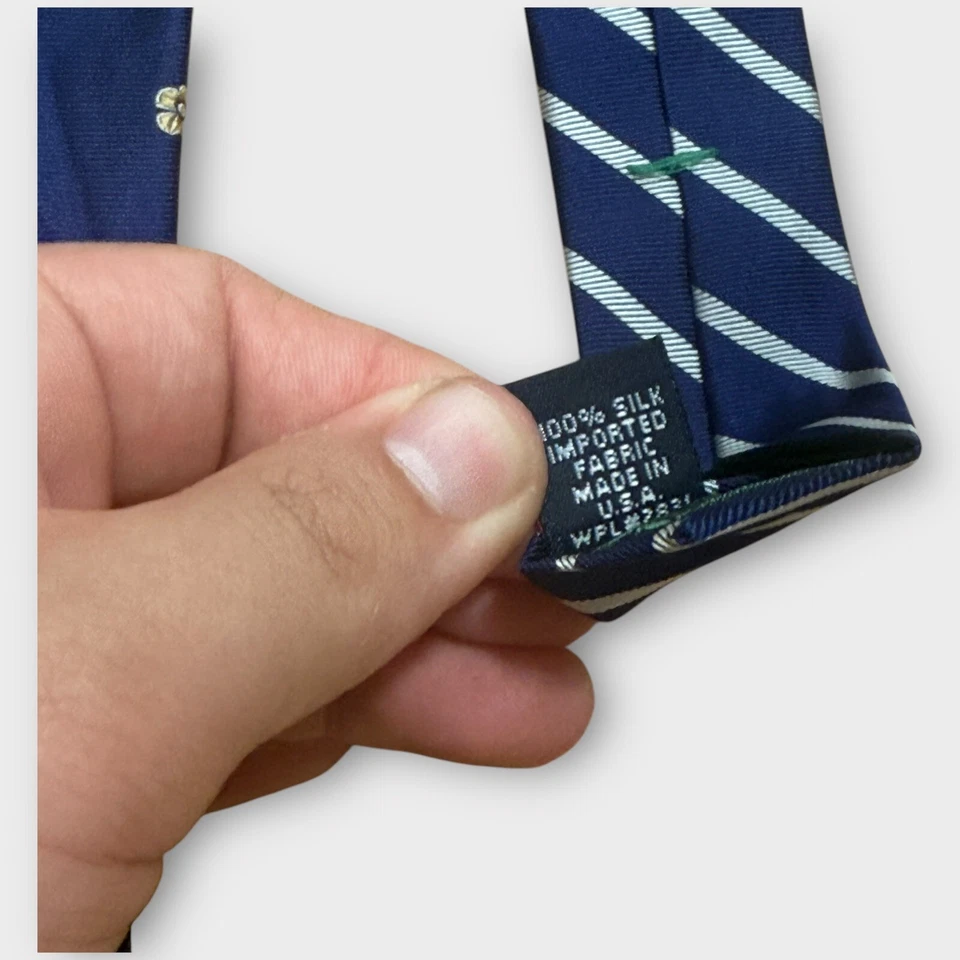 Corbata Tommy Hilfiger 100 % seda italiana azul marino amarillo estampado floral por todas partes Foto 4 de 4