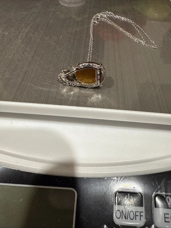 This is a silver 18” necklace with a tiger's eye like pendant. - Image 3 of 4