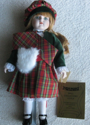 NEW COLLECTIBLE SEYMOUR MANN DOLL, LORNA, ON STAND, IN BOX WITH PAPERS