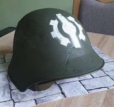 Schweizer Stahlhelm M18 Rauhtarn mit Emblem. Original