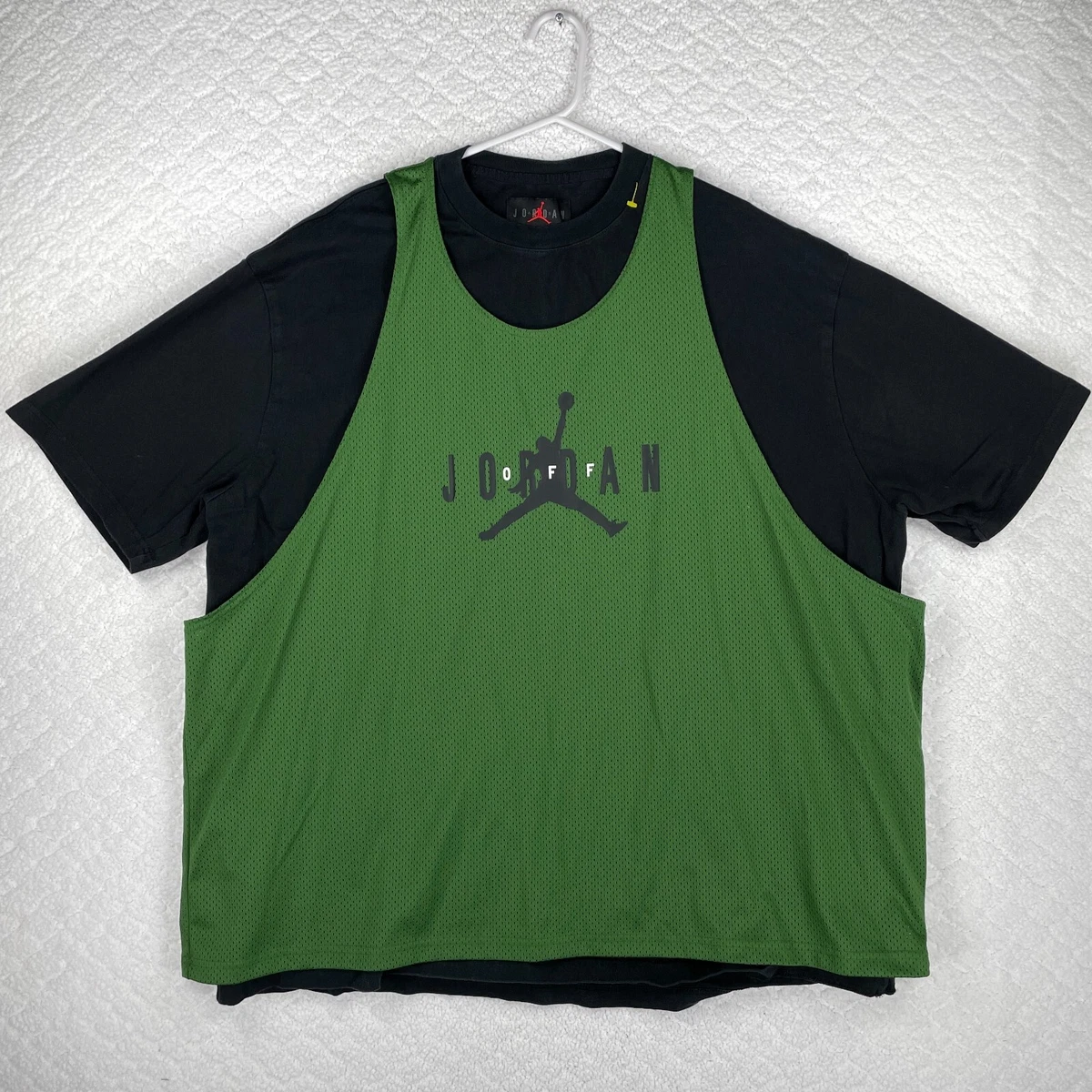 green and black off white shirt