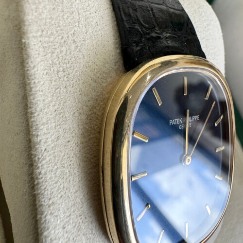 Patek Philippe cadran bleu ellipse dorée remontage manuel 31 mm or jaune 3738 - Photo 8/15