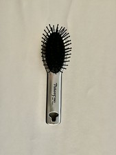 Pinkee's Pro EA detangling hairbrush