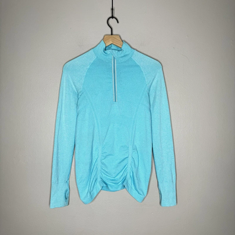 athleta fastest track ruched half zip 