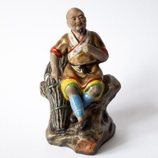 Chinese Vintage Porcelain Figure of a Seated Man Farmer Mid 20th Century