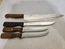 Old Homestead Lifetime Cutlery Chef's, Slicing, & Two Utility Knives Lot 