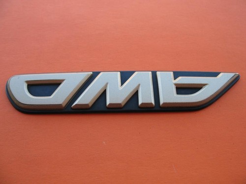 00 01 02 03 04 SUBARU LEGACY OUTBACK AWD TAPA TRASERA EMBLEMA DORADO LOGOTIPO INSIGNIA SIGNO #5 - Imagen 2 de 3