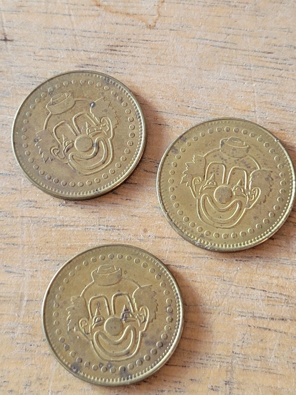 Clown-themed arcade tokens, often used in amusement game machines  lot of 3