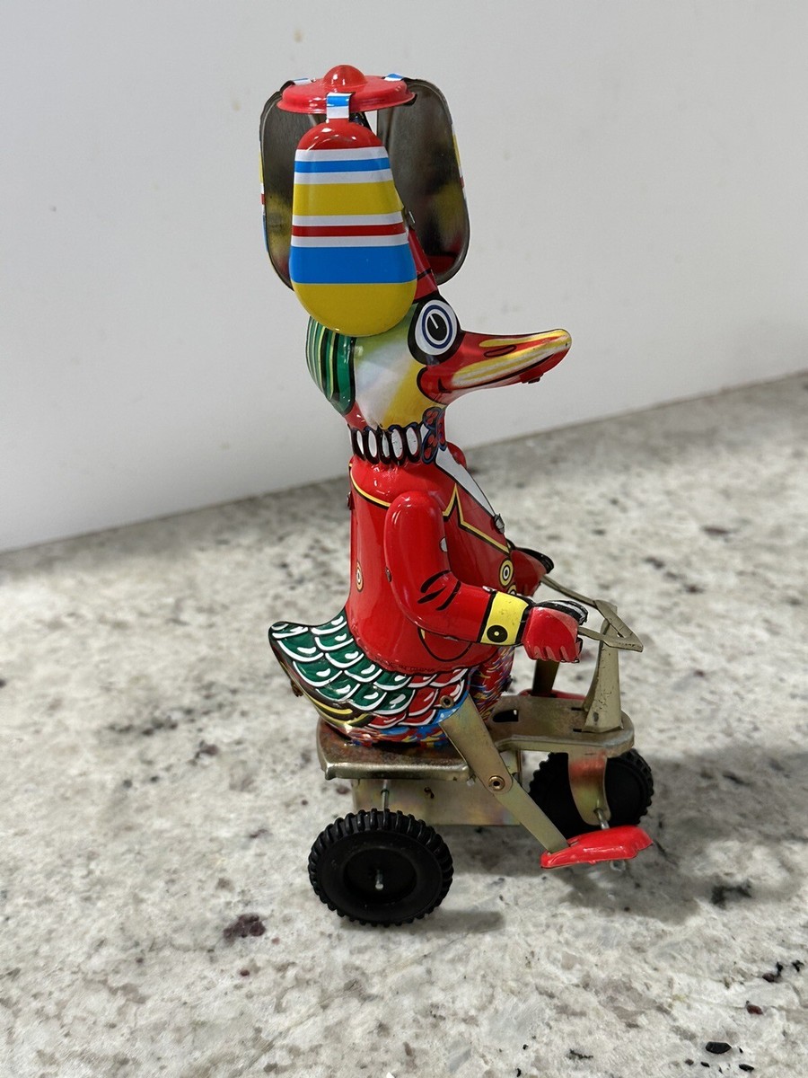 VINTAGE LITHO TIN Wind Up Duck on Bicycle Helicopter Top VINTAGE LITHO TIN Wind Up Duck on Bicycle Helicopter Top