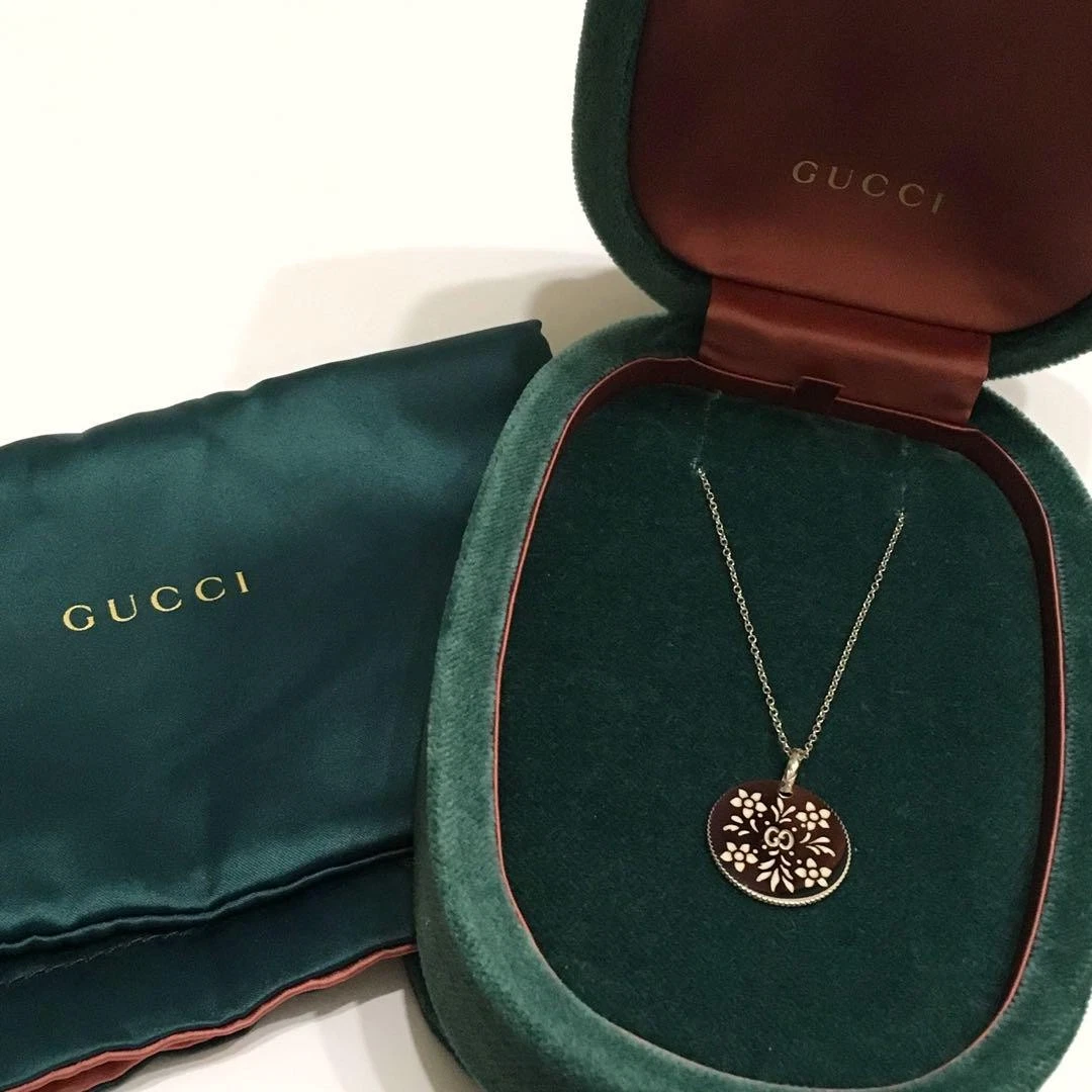 Collier Gucci K18WG bijoux fins breloque double face or blanc