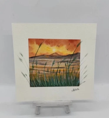 Peinture à l'aquarelle encadrée - Coucher de soleil sur un lac avec montagne - Photo 1/2