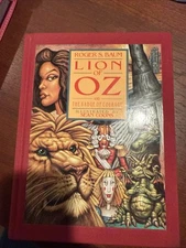 Signed First Edition LION OF OZ & BADGE OF COURAGE BY ROGER S. BAUM