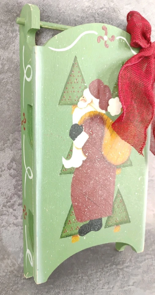 Примитивный деревянный настенный декор Санта-Клауса с ручной росписью народное искусство сани красный бант - Изображение 4 из 4