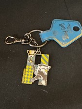 Wizarding World Of Universal Harry Potter Keychain NEW - HUFFLEPUFF House Symbol