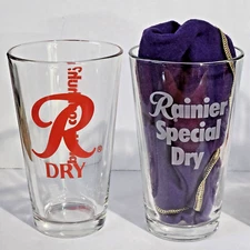 Lot of 2 Rainier Dry Beer Glasses 2 Different Logos 16oz 5 7/8" Tall