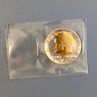 DANBURY MINT- 1984-D- KENNEDY HALF DOLLAR UNCIRCULATED - GOLD AND SILVER PLATED