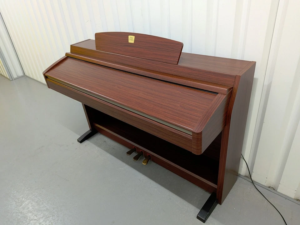 Yamaha Clavinova CLP-230 digital piano in mahogany finish stock number 26369, photo 1 of 5