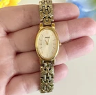 Vintage Seiko Women’s Slim Oval Ornate Cocktail Dress Watch-Petit Champagne Dial