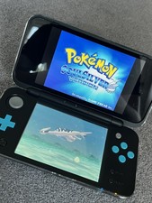 New Nintendo 2DS XL Pokémon Fan Pack Console Bundle - 2 Copies Of Pokemon SL