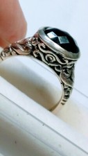 ATTRACTIVE STERLING SILVER RING WITH BLACK ONYX IN SIZE 7.25 