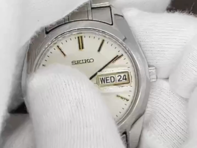 SEIKO SBQL003 Perpetual Calendar Quartz 8F33-0040 Ivory Dial SS