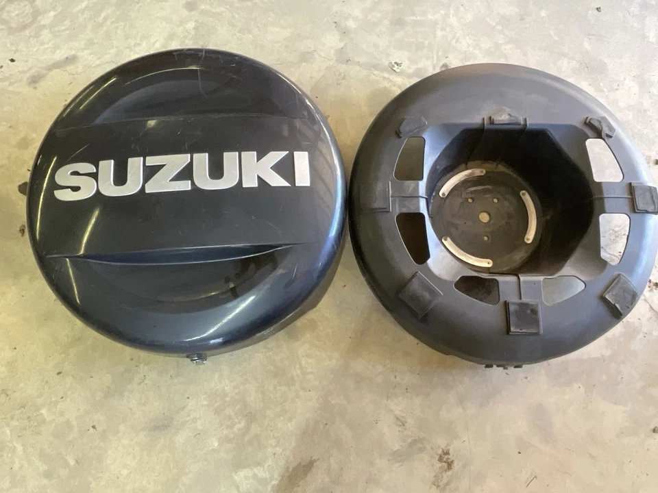 Suzuki Grand Vitara 2006-2012 cubierta rígida cubierta de neumático completa 2 piezas OEM Foto 3 de 4