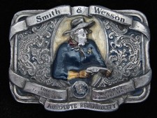 QG13132 VINTAGE 1989  SMITH  WESSON ABSOLUTE RELIABILITY  GUN BELT BUCKLE