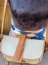 Vintage Dooney  Bourke Peddle Leather Crossbody Bag Two-Ton Color Tan.preOwn.