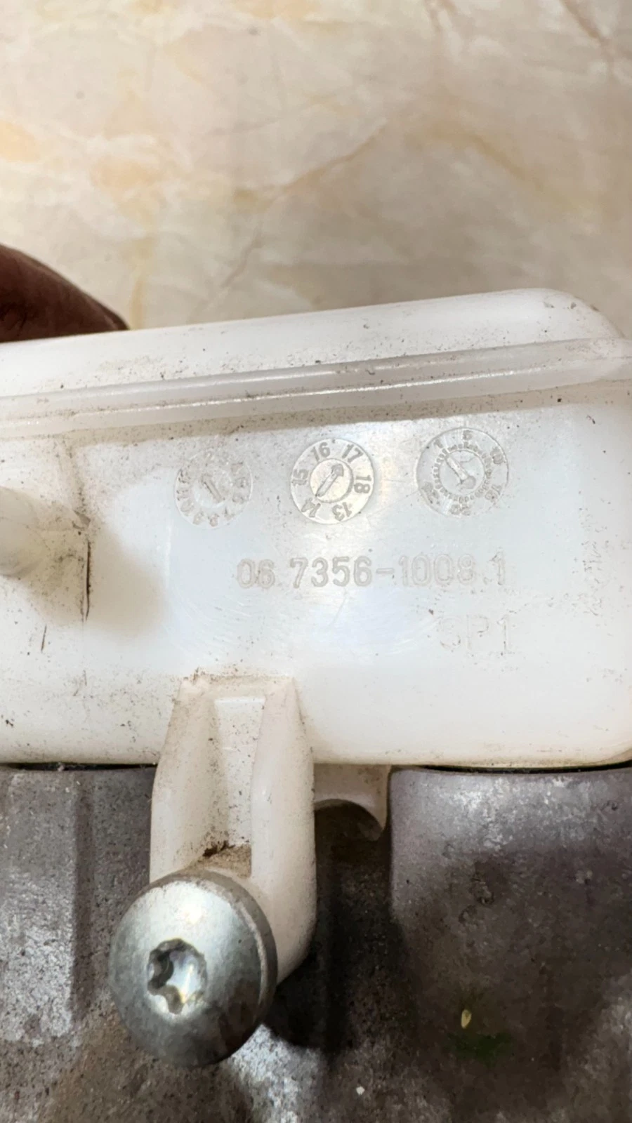 06735610081 brake master cylinder identification marking close up
