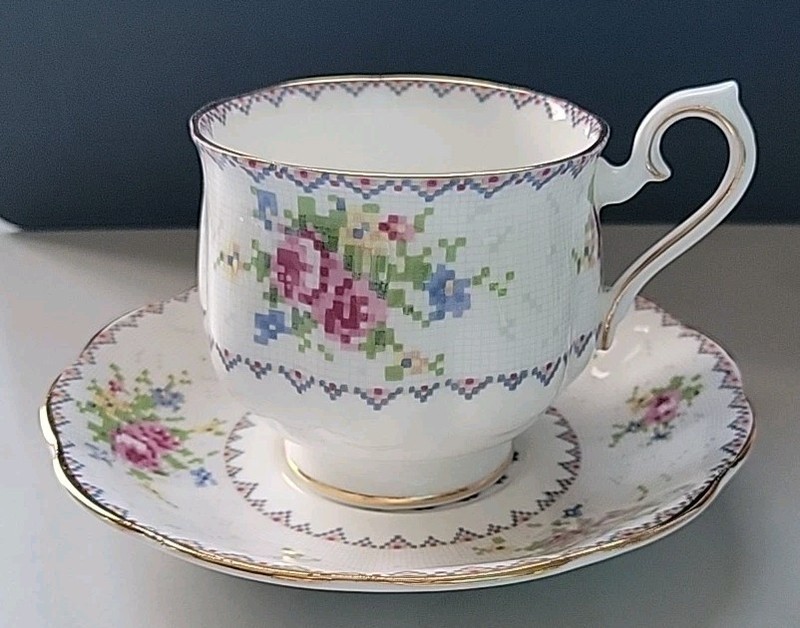 Royal Albert "Petit Point" Cup And Saucer. Fine Bone China. Made in England. 3in