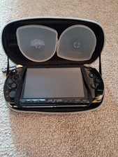 Sony PSP Black Handheld Game System UNTESTED NO CHARGER Plus 2x Game Cases