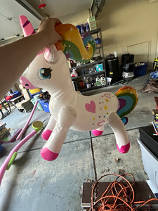 Inflatable Ride-On Unicorn Pool Float, White Pink Multicolor Rainbow Tail