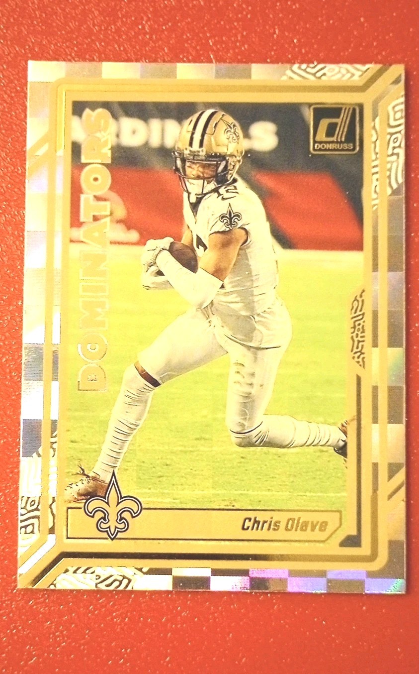 Chris Olave #D-26 Football Cards 2023 Panini Donruss Dominators trading card — raw and PSA graded price guide